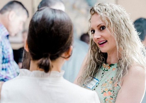 woman listening intently in a conversation