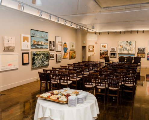 art gallery with chairs set up for presentation