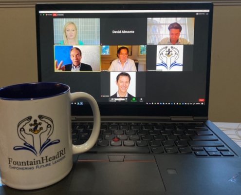 online meeting on a laptop wth coffee mug